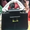 Black Structured Handbag with Gold T-Bar Clasp